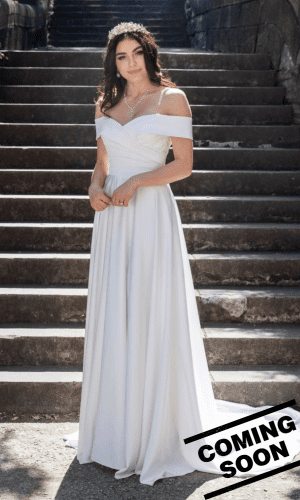 Lucky Sixpence Bridal bridal gown. Wings of a Dove. A satin off-the-shoulder bridal gown.