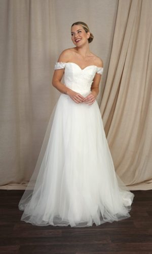 Lucky Sixpence Bridal wedding dress, Emma Bridals BL440 "Isla". Off-the-shoulder ivory wedding dress with delicate lace appliques.